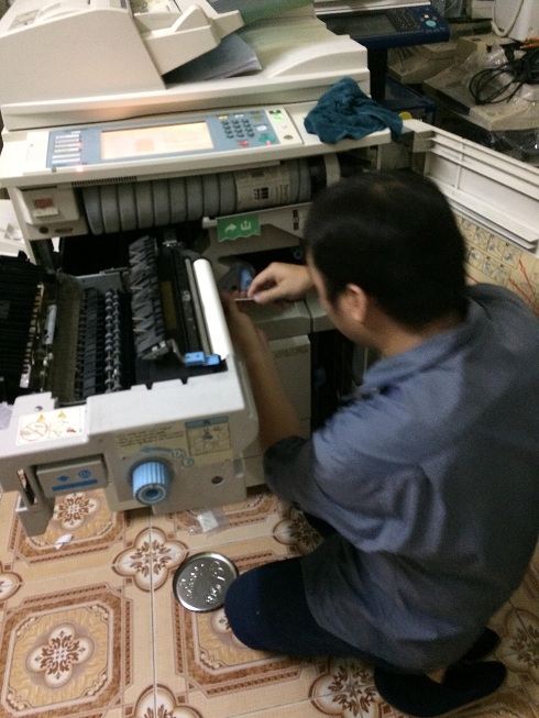 sửa máy photo kẹt và nhăn giấy